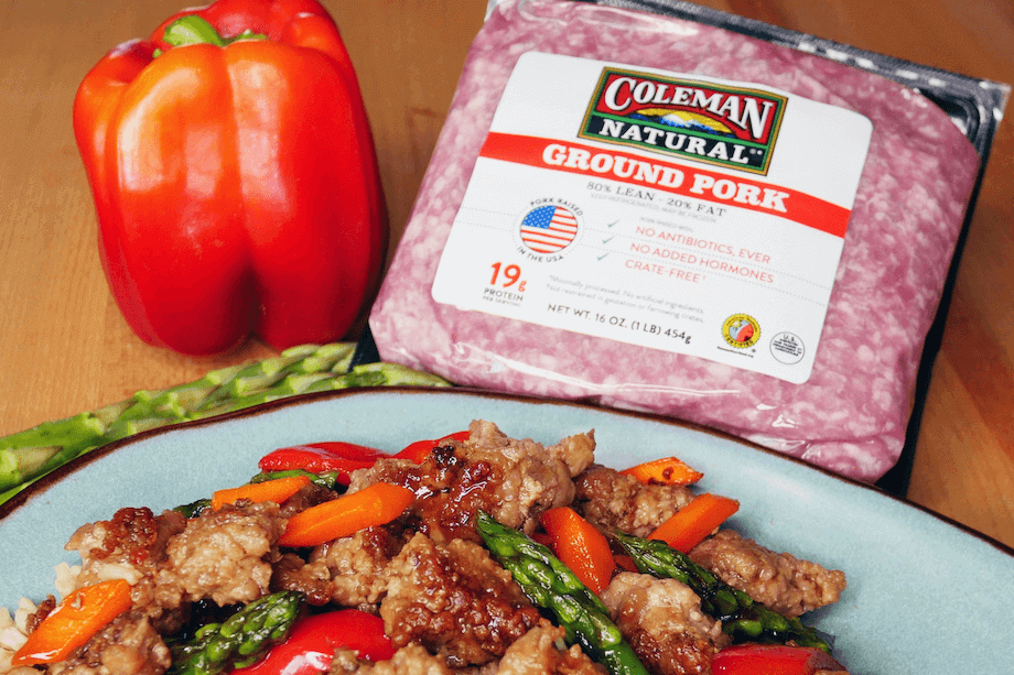 How Long Can You Keep Meat in the Freezer? 1 Cooked ground pork and rice on a plate next to an unopened package of ground pork